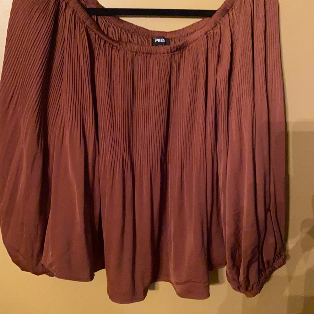 Express brand.  NWT size medium blouse. Rust color